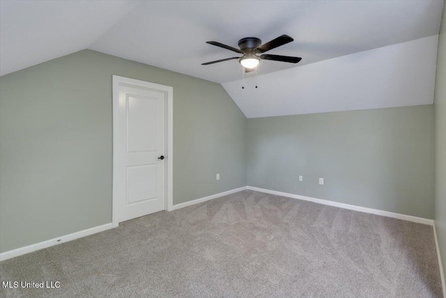 additional living space with carpet, ceiling fan, and lofted ceiling