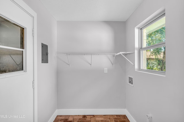 washroom featuring washer hookup and electric panel