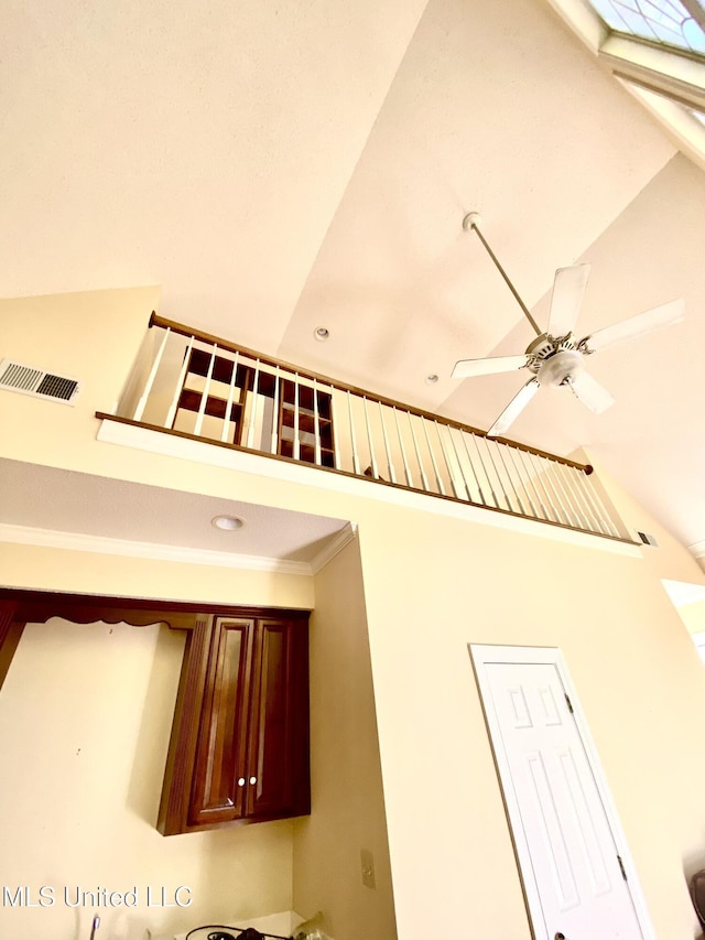 interior details with a ceiling fan and visible vents