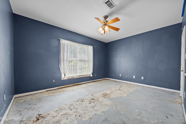 224 Clarence Ave, Pass Christian, MS 39571 - unfurnished room with baseboards, a ceiling fan, and concrete flooring