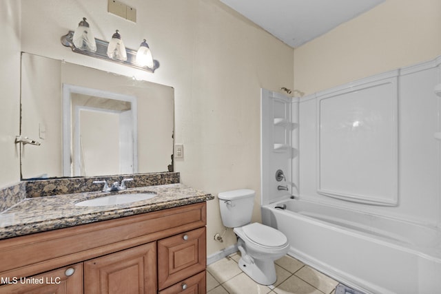 224 Clarence Ave, Pass Christian, MS 39571 - bathroom with tile patterned flooring, vanity, toilet, shower / bath combination, and baseboards