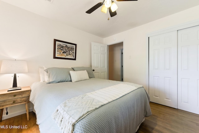 2508 Orrell Dr, Gautier, MS 39553 - bedroom featuring wood finished floors, a closet, a ceiling fan, and baseboards