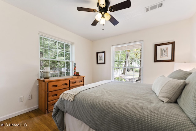 2508 Orrell Dr, Gautier, MS 39553 - bedroom featuring wood finished floors, baseboards, and ceiling fan
