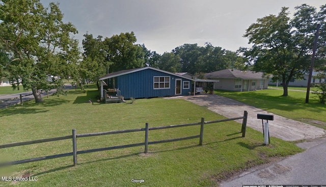 view of front of home with a front yard