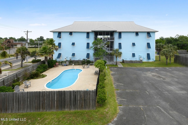 view of pool with a patio