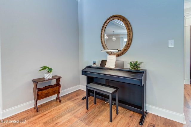 miscellaneous room with light hardwood / wood-style flooring