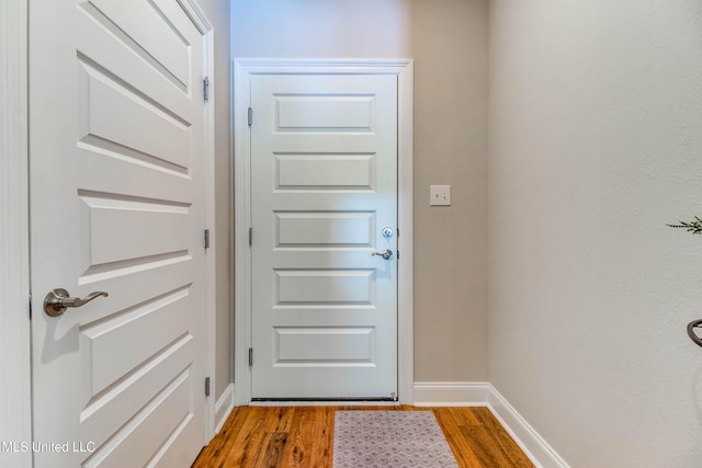 doorway featuring hardwood / wood-style flooring