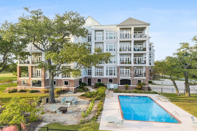 view of pool featuring a patio area