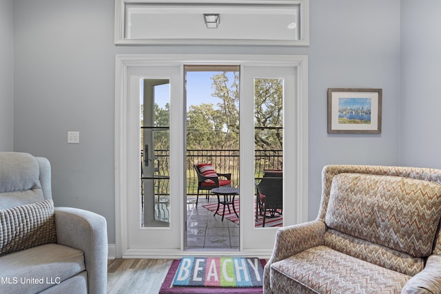 sitting room featuring light wood-type flooring