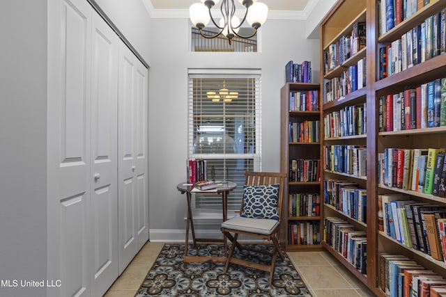 sitting room featuring crown molding, light tile patterned floors, and a chandelier