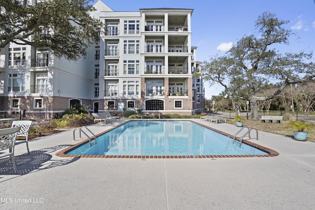 view of pool featuring a patio area