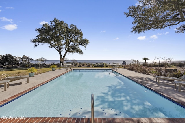 view of pool featuring a patio