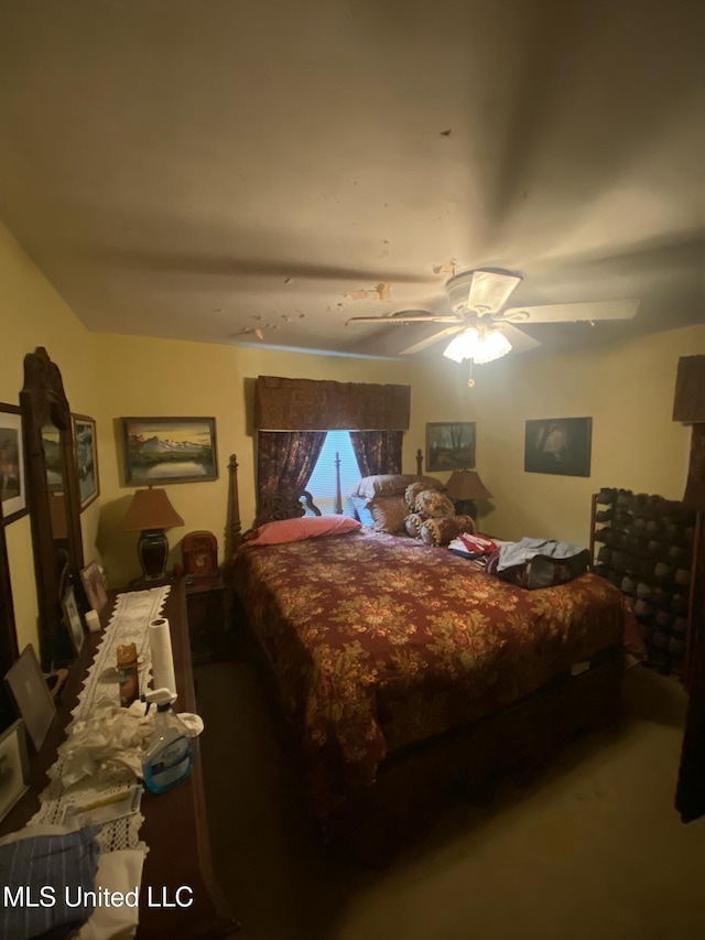 210 Colonial Cir, Jackson, MS 39211 - carpeted bedroom with a ceiling fan