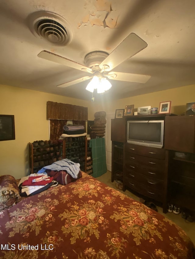 210 Colonial Cir, Jackson, MS 39211 - bedroom featuring a ceiling fan