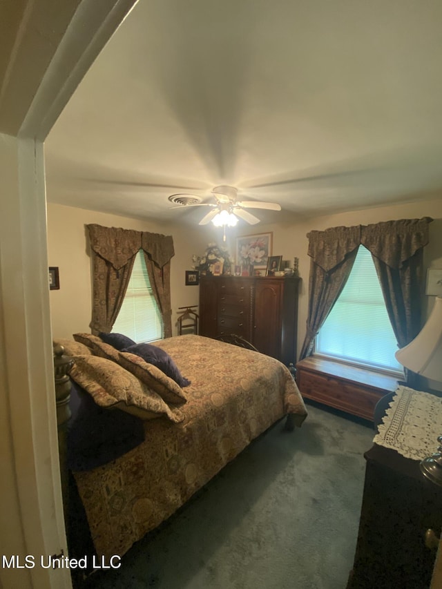 210 Colonial Cir, Jackson, MS 39211 - bedroom with carpet floors and ceiling fan