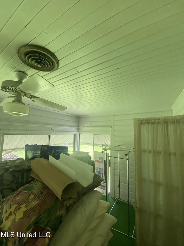 210 Colonial Cir, Jackson, MS 39211 - bedroom with wood ceiling and a ceiling fan