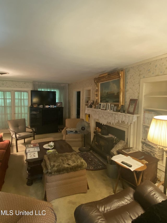 210 Colonial Cir, Jackson, MS 39211 - living room with a fireplace, wallpapered walls, and carpet floors