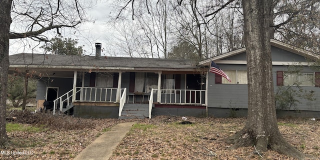 ranch-style home featuring crawl space and covered porch