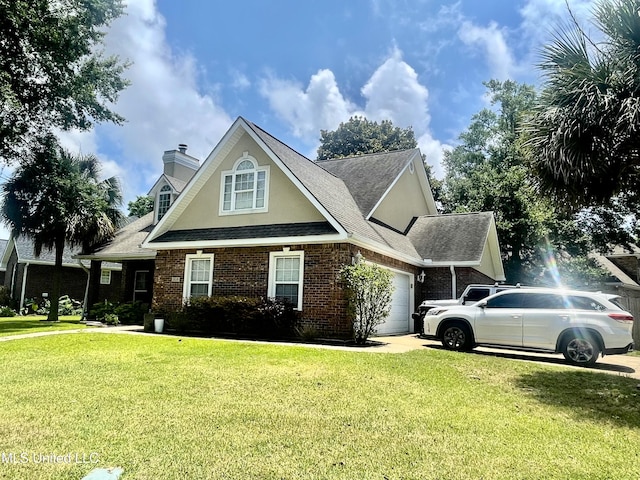 view of side of property featuring brick siding, concrete driveway, a chimney, a yard, and an attached garage