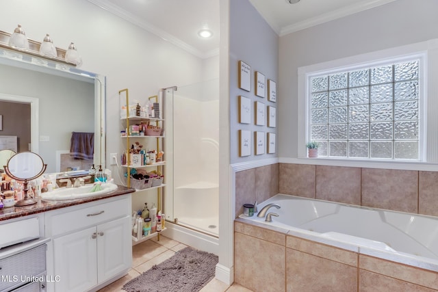 full bathroom with tile patterned flooring, a garden tub, ornamental molding, a stall shower, and vanity