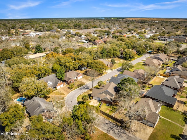 birds eye view of property with a residential view