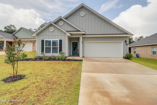 87139 Highpoint Dr, Diamondhead, MS 39525 - view of front of house with board and batten siding, an attached garage, a front yard, and concrete driveway