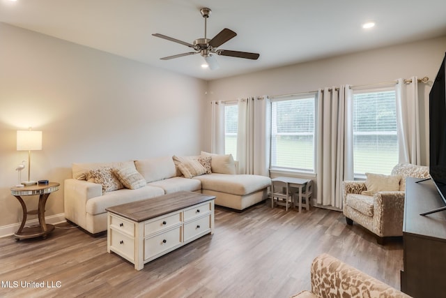 87139 Highpoint Dr, Diamondhead, MS 39525 - living room featuring plenty of natural light, ceiling fan, wood finished floors, and recessed lighting