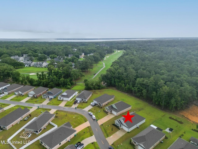 87139 Highpoint Dr, Diamondhead, MS 39525 - aerial overview of property's location featuring nearby suburban area and a forest