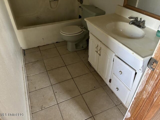2728 Dogwood Ln, Moss Point, MS 39562 - full bathroom with tile patterned floors, toilet, and vanity
