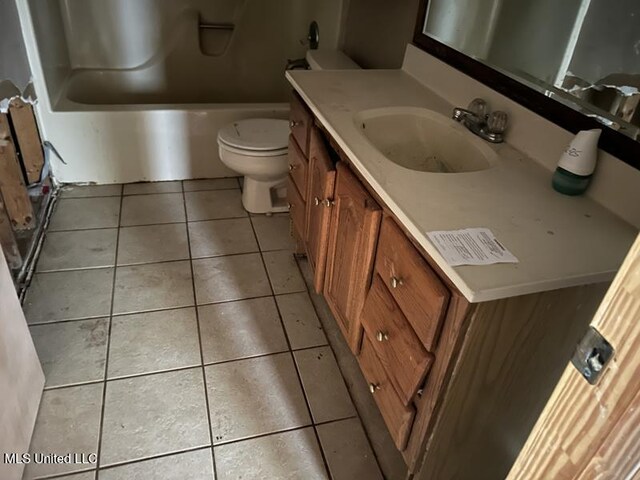 2728 Dogwood Ln, Moss Point, MS 39562 - full bath featuring toilet, vanity, and tile patterned flooring