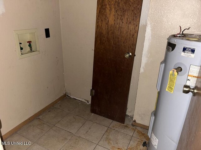 2728 Dogwood Ln, Moss Point, MS 39562 - utility room featuring electric water heater