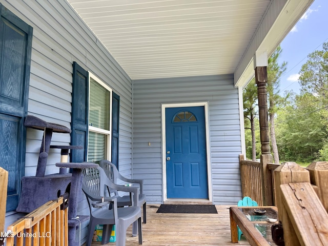 6088 E Hinds St, Bay Saint Louis, MS 39520 - view of exterior entry featuring covered porch