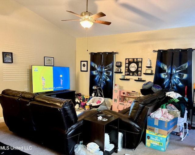 6088 E Hinds St, Bay Saint Louis, MS 39520 - carpeted living area with ceiling fan and vaulted ceiling