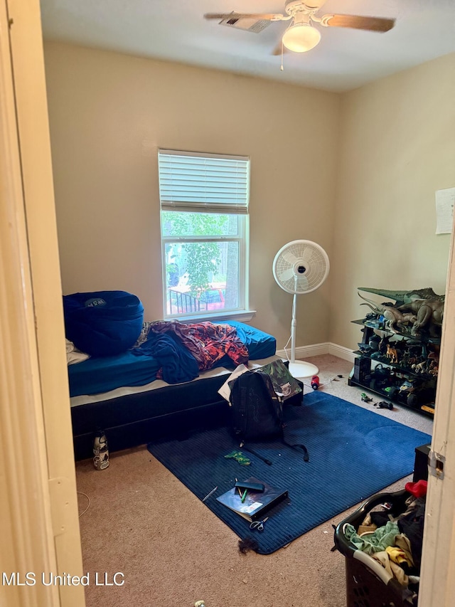 6088 E Hinds St, Bay Saint Louis, MS 39520 - bedroom with carpet flooring and a ceiling fan