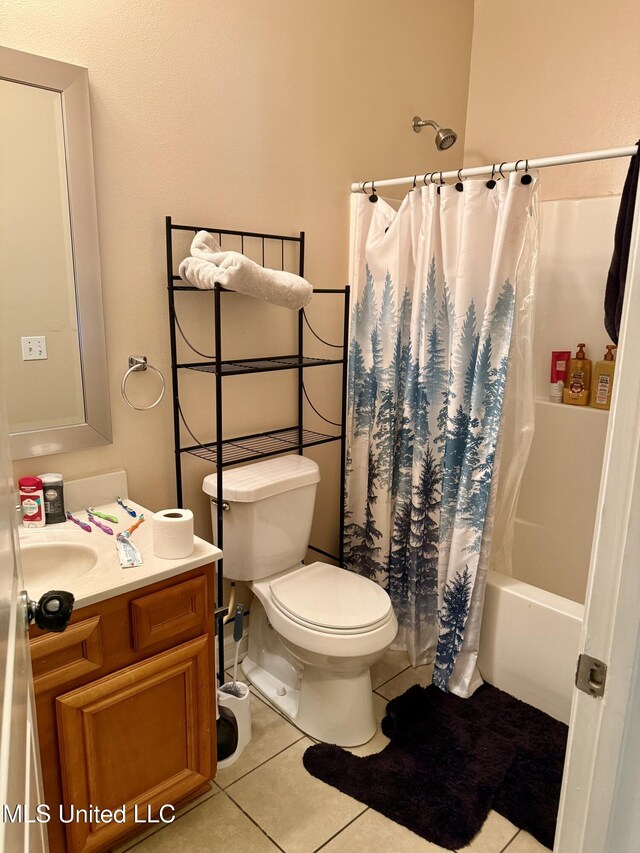 6088 E Hinds St, Bay Saint Louis, MS 39520 - bathroom with vanity, tile patterned flooring, and shower / bath combo