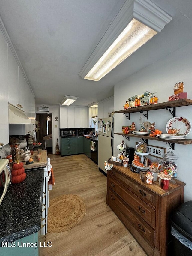 kitchen featuring black dishwasher, light hardwood / wood-style flooring, white range, refrigerator, and white cabinets