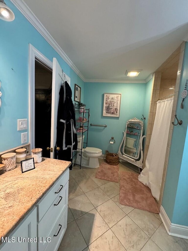 bathroom featuring vanity, toilet, crown molding, and walk in shower