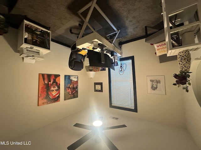 living room featuring ceiling fan