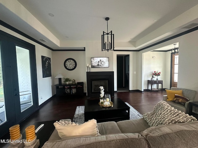 living room with dark hardwood / wood-style flooring