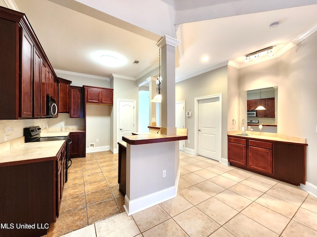 kitchen featuring light tile patterned floors, decorative columns, crown molding, appliances with stainless steel finishes, and sink