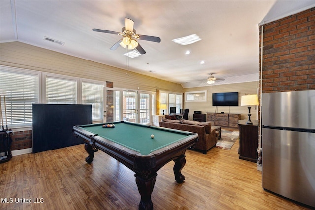 rec room with ceiling fan, light wood-type flooring, lofted ceiling, and billiards