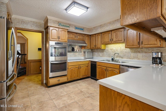 kitchen featuring sink, crown molding, light tile patterned floors, a textured ceiling, and appliances with stainless steel finishes