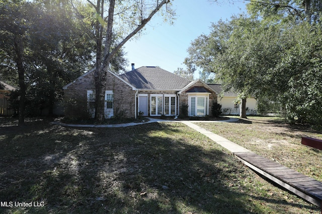 63720 N Diamondhead Dr, Diamondhead, MS 39525 - view of front of home with a front lawn