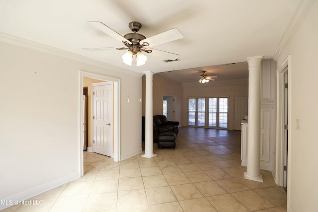 63720 N Diamondhead Dr, Diamondhead, MS 39525 - unfurnished living room featuring ornate columns, ornamental molding, ceiling fan, light tile patterned floors, and baseboards