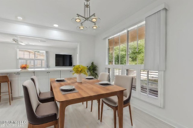 dining space featuring an inviting chandelier and recessed lighting