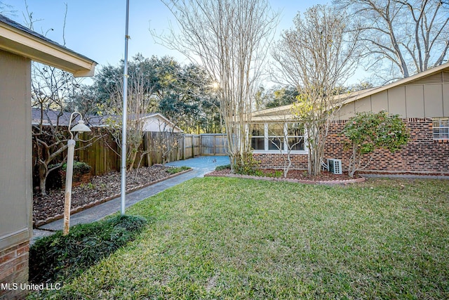 view of yard featuring a fenced backyard