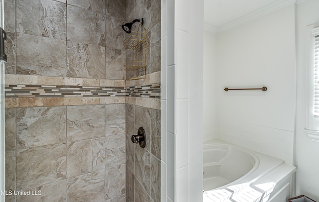 bathroom with shower with separate bathtub and crown molding