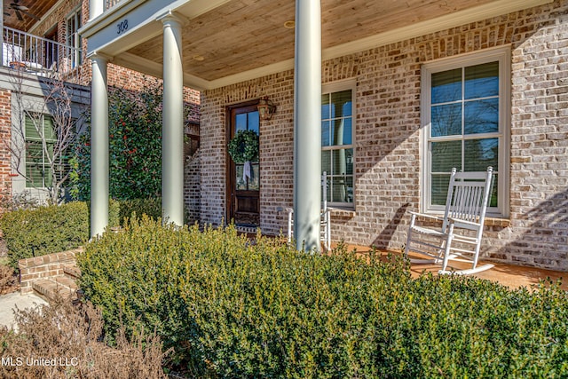 doorway to property featuring a porch