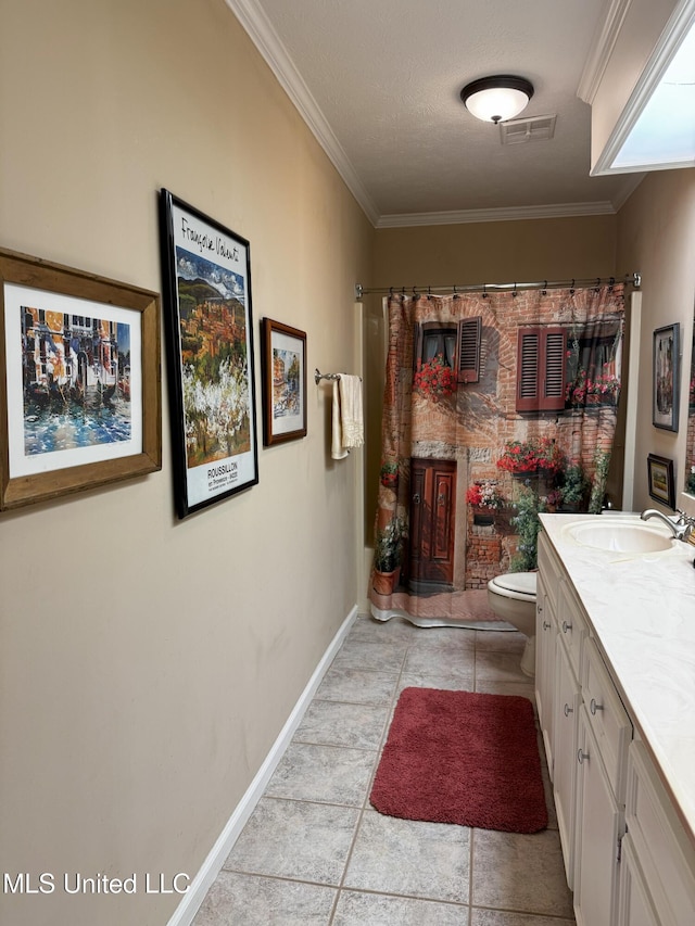 bathroom with crown molding, visible vents, vanity, toilet, and baseboards