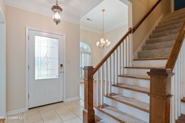 6375 Darren Dr, Olive Branch, MS 38654 - entrance foyer featuring stairs, ornamental molding, tile patterned flooring, baseboards, and a chandelier